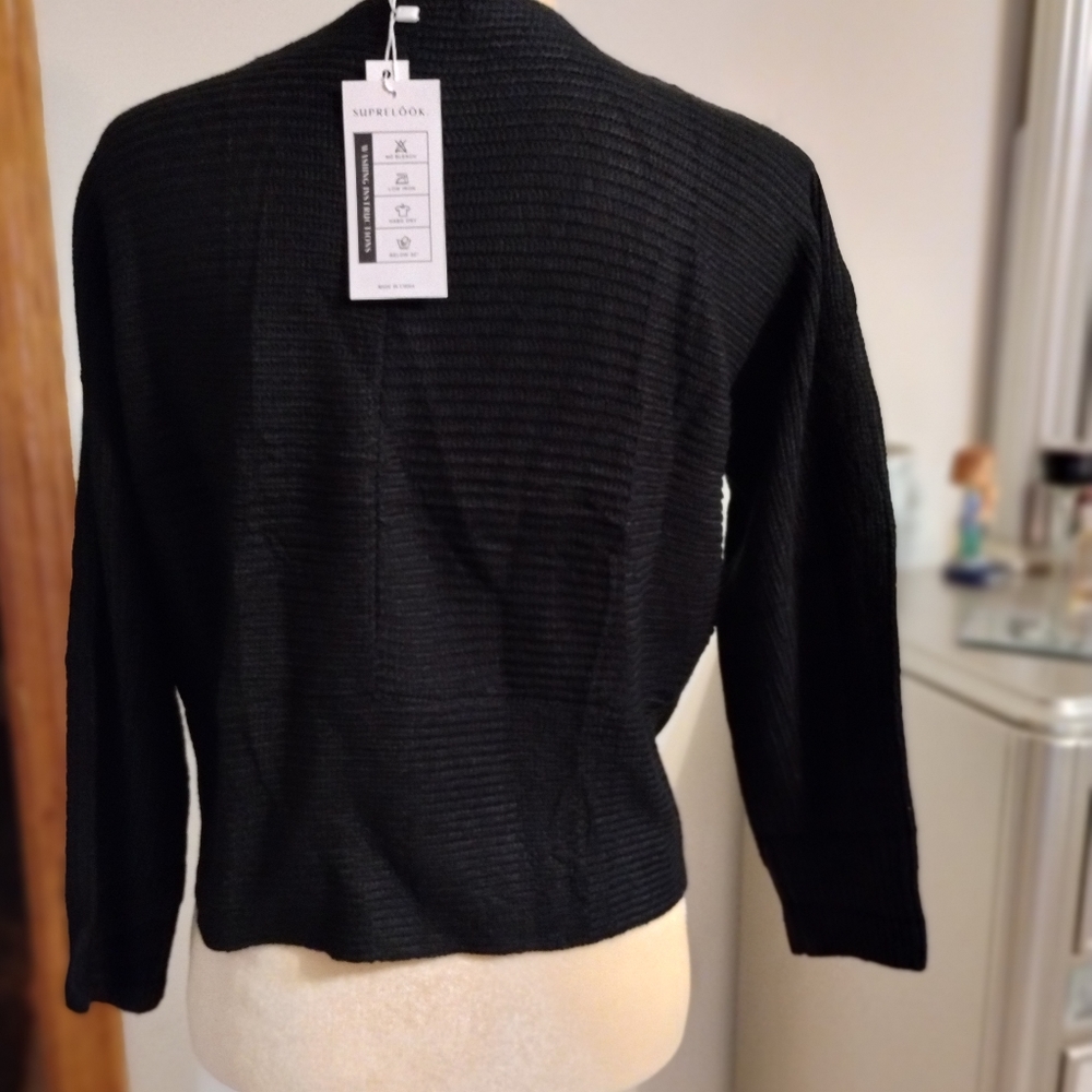 Woman's black sweater